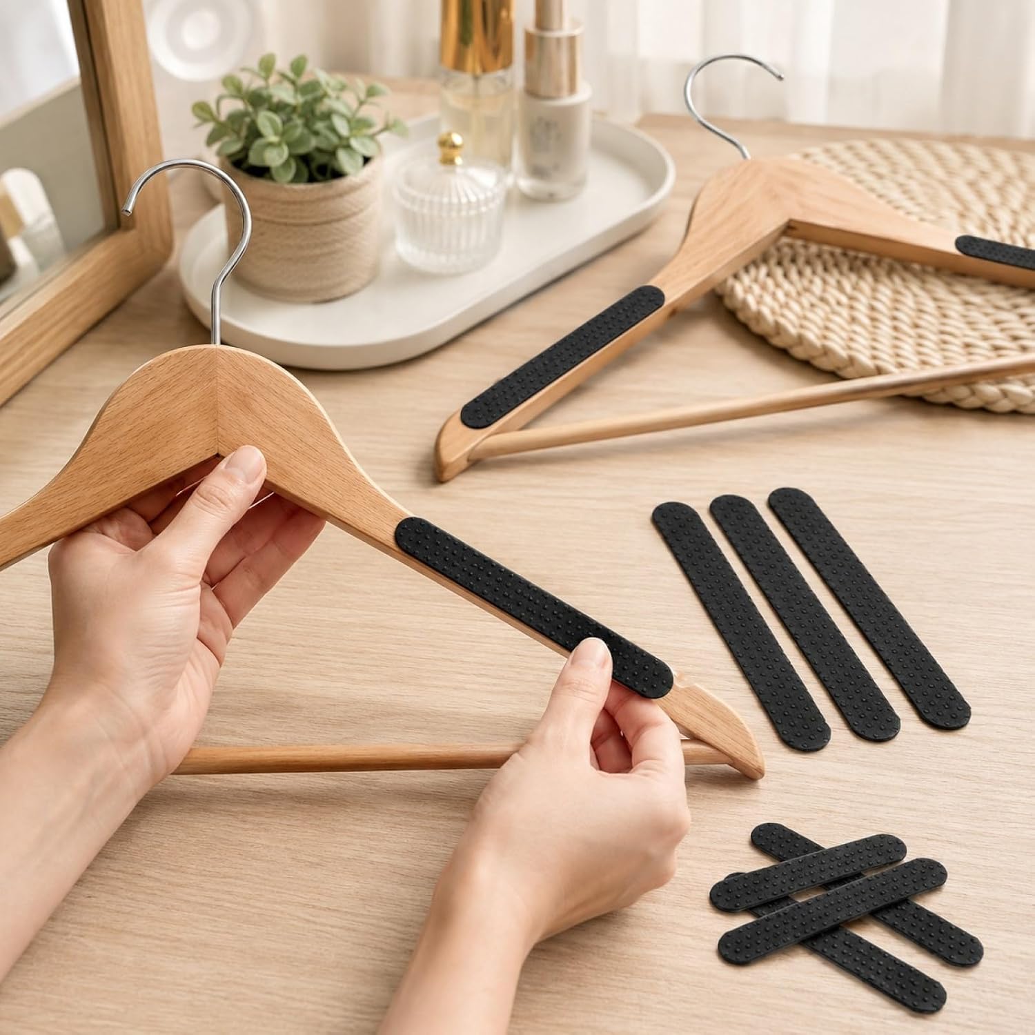 LOGOFUN 100pcs Silicone Non-Slip Hanger Grips for Closet - Black | Clear rubber strips with adhesive backing, prevent clothes from slipping, suitable for wood or plastic hangers.