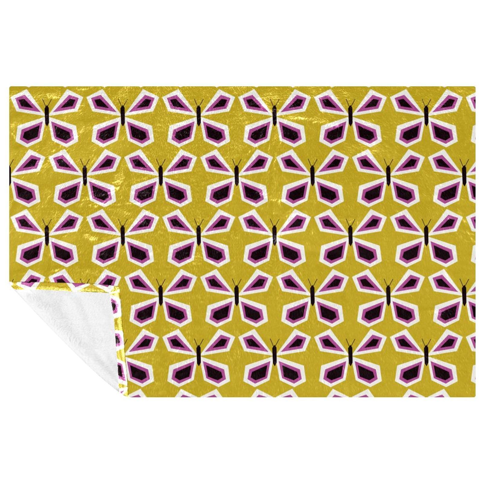 Couverture douce motif papillon jaune pour un cocon de bien-être sur votre lit