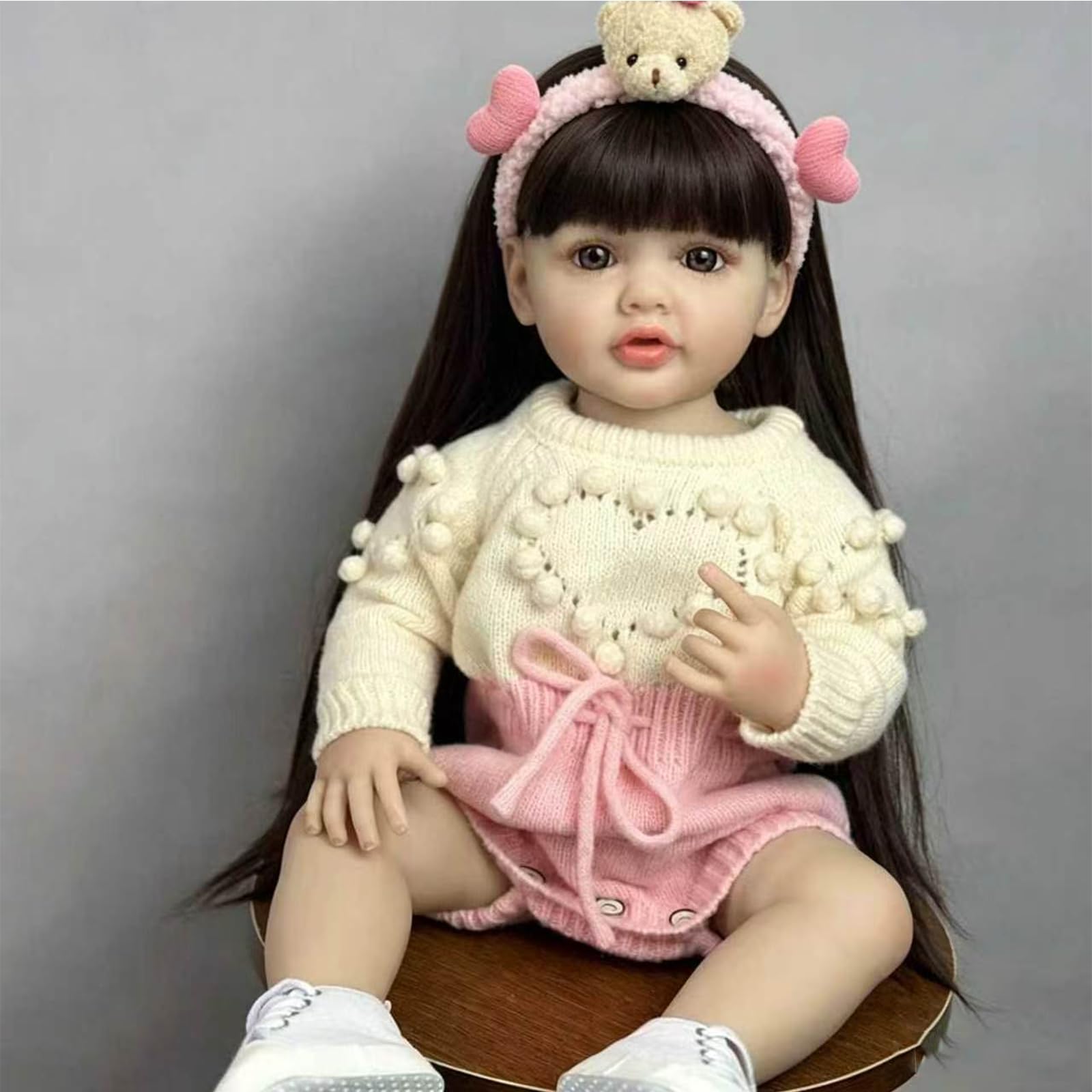 Reborn Lalka 55 cm Realistyczne Dziecko Miękki Silikonowy Winyl, Noworodek Dziewczyna Z Ruchomymi Stawami, Długie Brązowe Włosy, Różowy Strój Z Akcesoriami