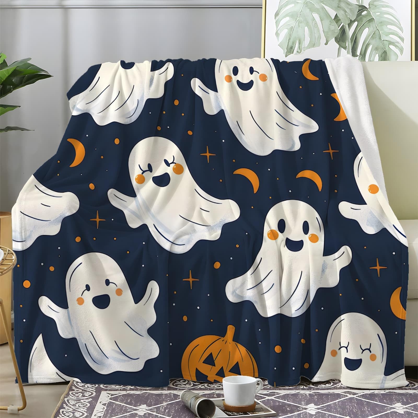 Couverture motif fantôme pour des soirées cocooning d'Halloween réussies