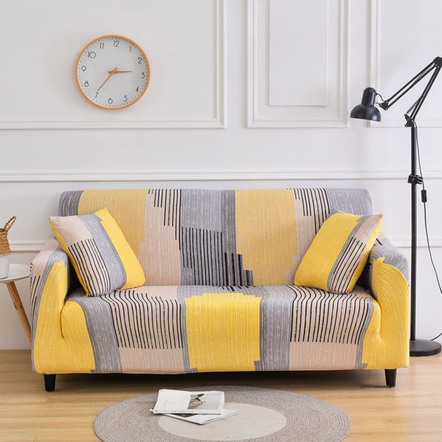 Housse de canapé extensible imprimée : rénovez facilement un fauteuil usé et tâché