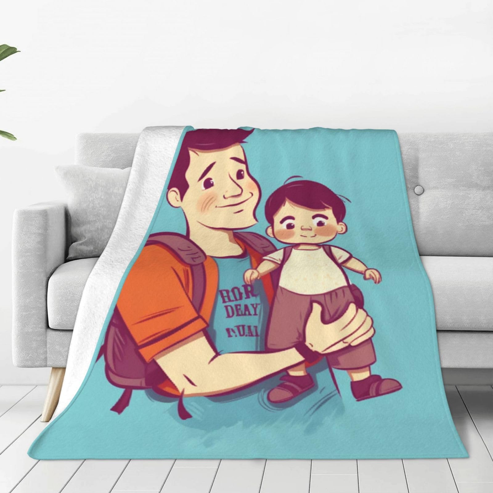 Couverture en micro polaire imprimée homme et enfant pour des soirées cocooning sur le canapé