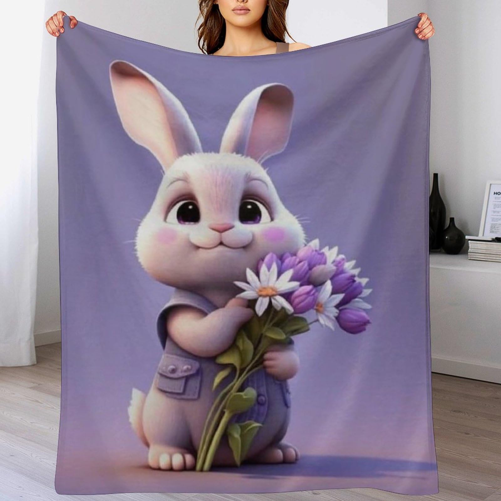 Couverture polaire lapin contre le froid du lit et du canapé