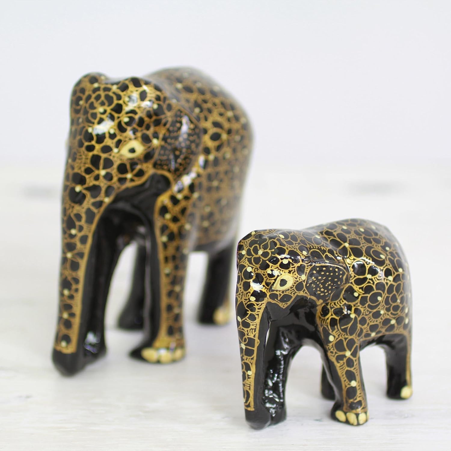 NOVICA Black Gold Tone Animal Themed Papier Mache Wood Sculpture 'Elephant Affection'
