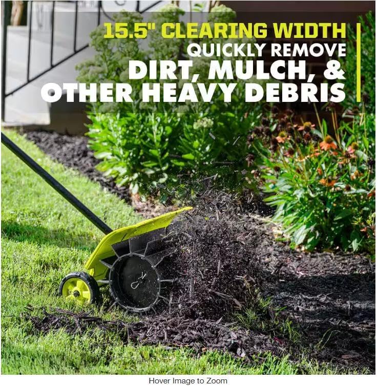 CUSHYBITE RYSWPRUB Rubber Sweeper Attachment clearing mulch from a lawn