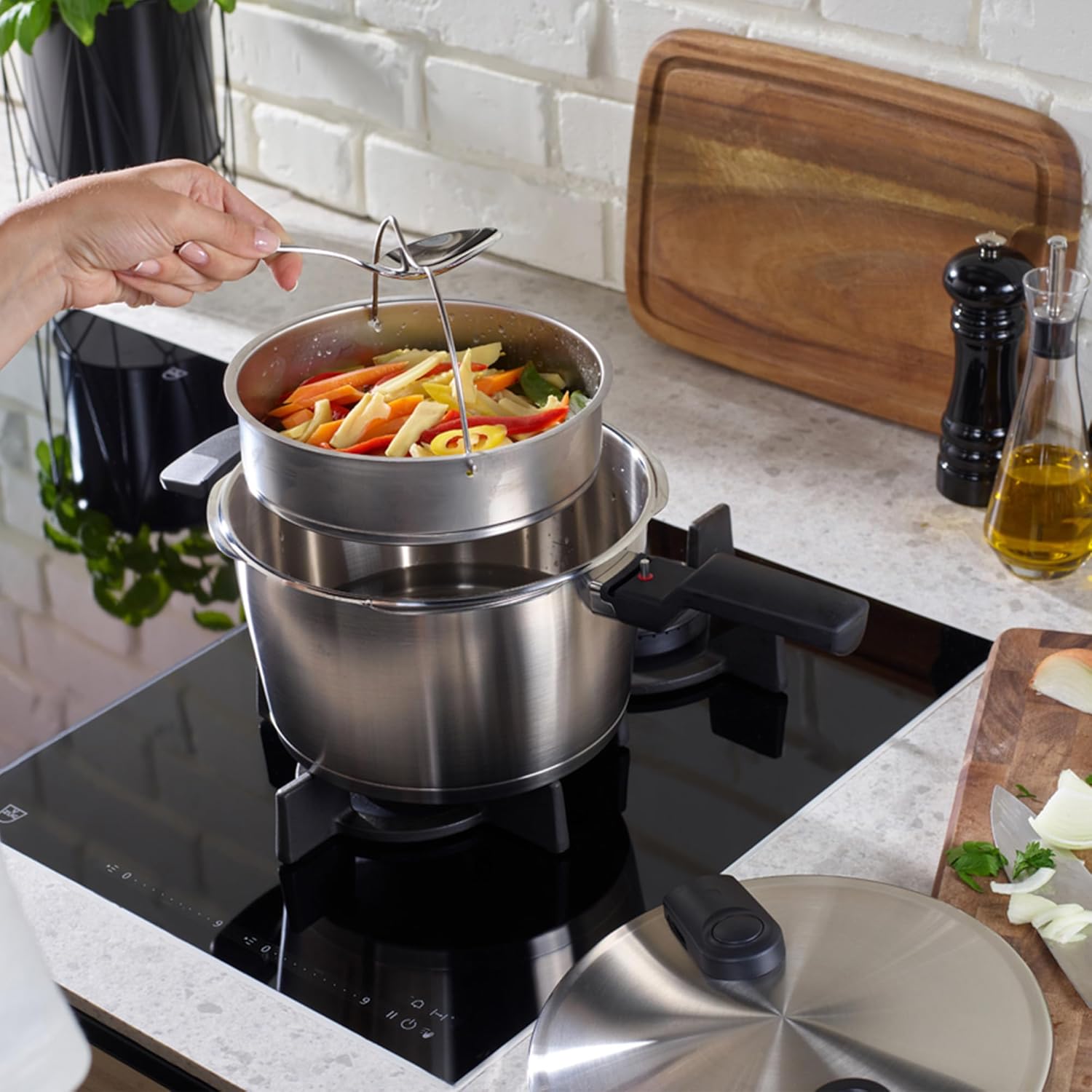 Fissler Vitaquick Premium Pressure Cooker, 10.6 Quart with Steamer Insert and Tripod