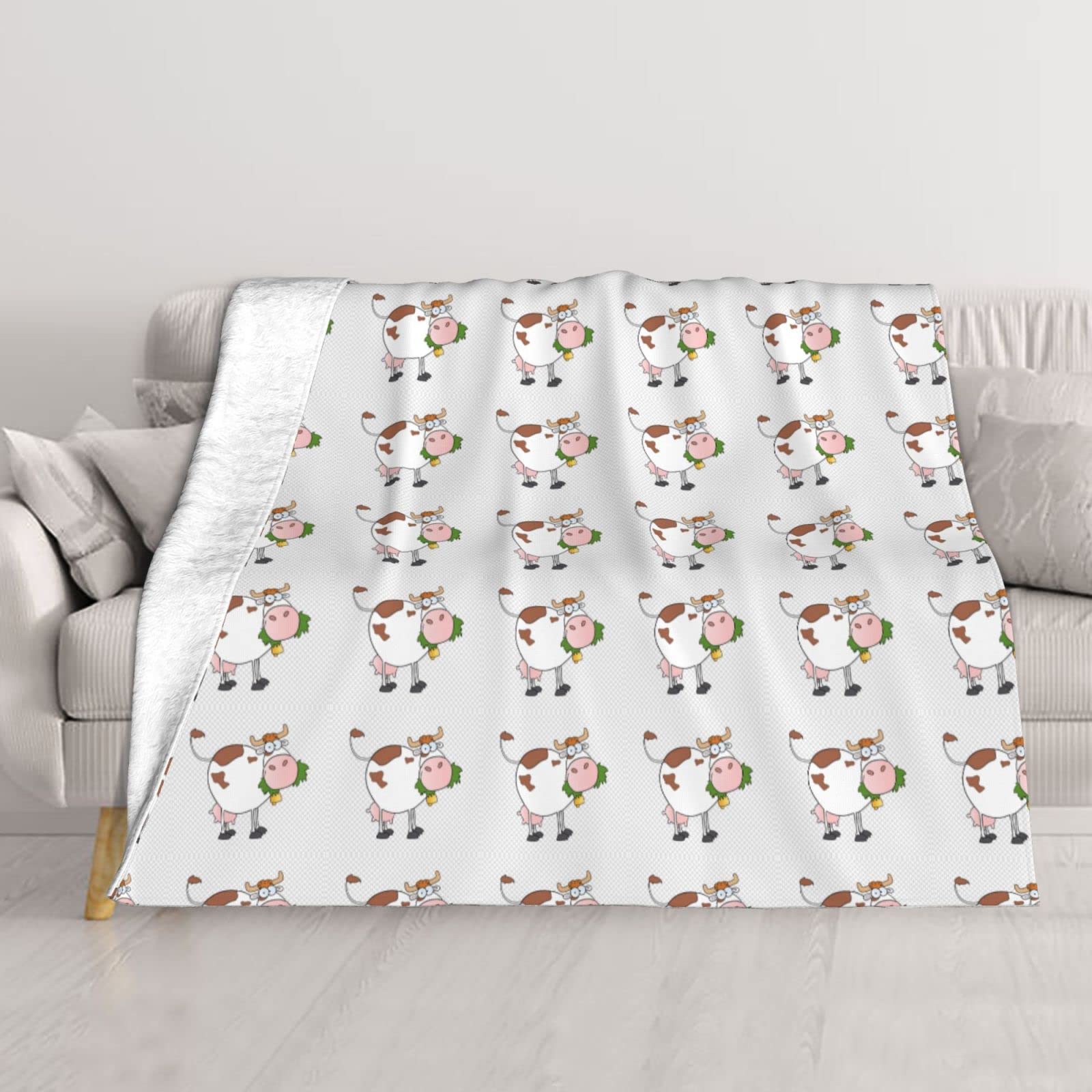 Couverture en peluche vache pour canapé et lit : votre plaid douillet 127x101 cm