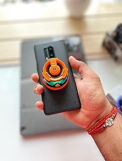 مكبر صوت بلوتوث لاسلكي مغناطيسي صغير من سي هوب، مكبر صوت محمول وقابل لإعادة الشحن بإضاءة ليد ار جي بي ديناميكية وحامل موبايل واتصال بلوتوث وصوت قوي (لون برتقالي)، DY100