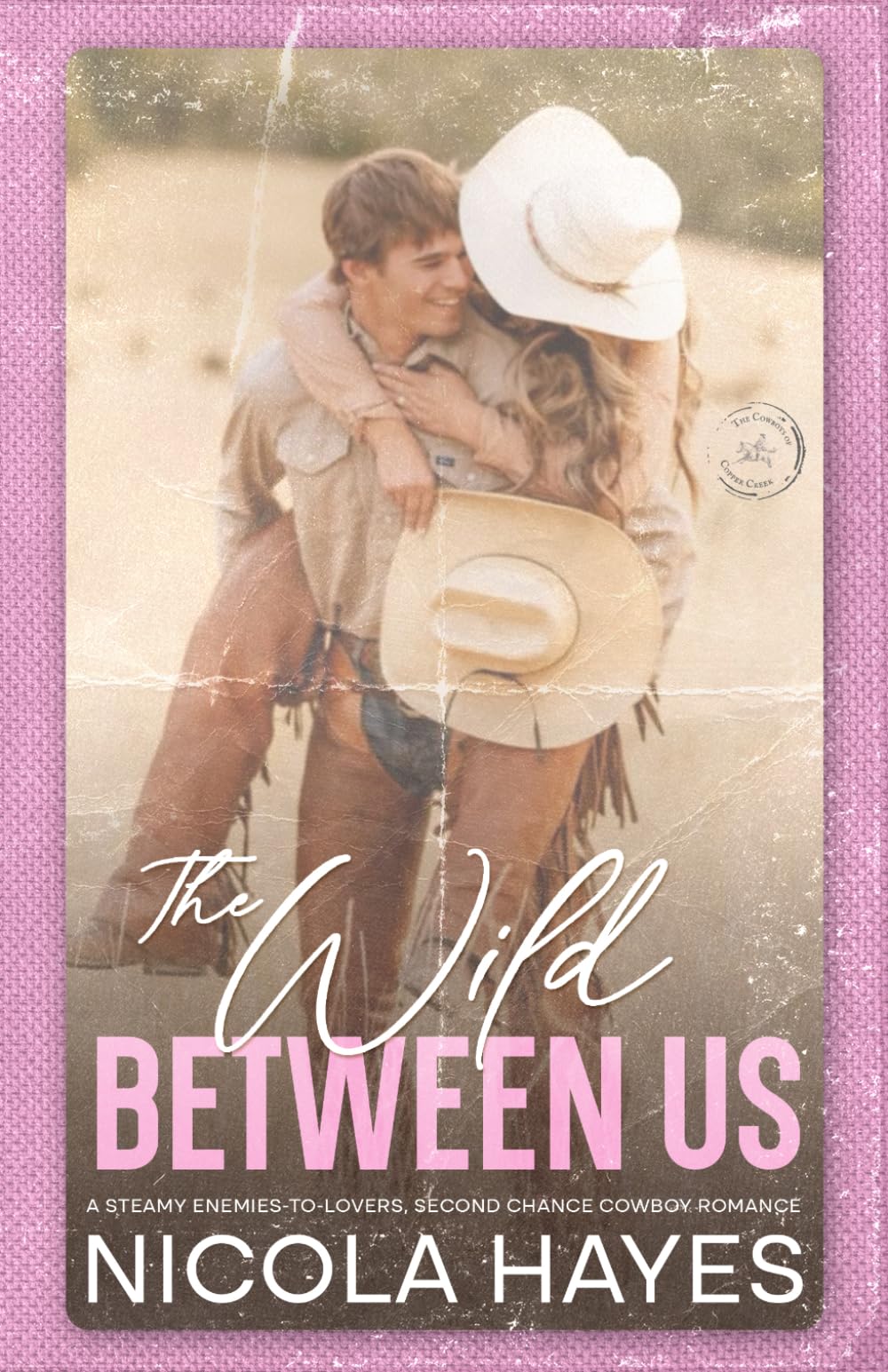 The Wild Between Us: A Steamy Enemies to Lovers Second Chance Cowboy Romance (Cowboys of Copper Creek)