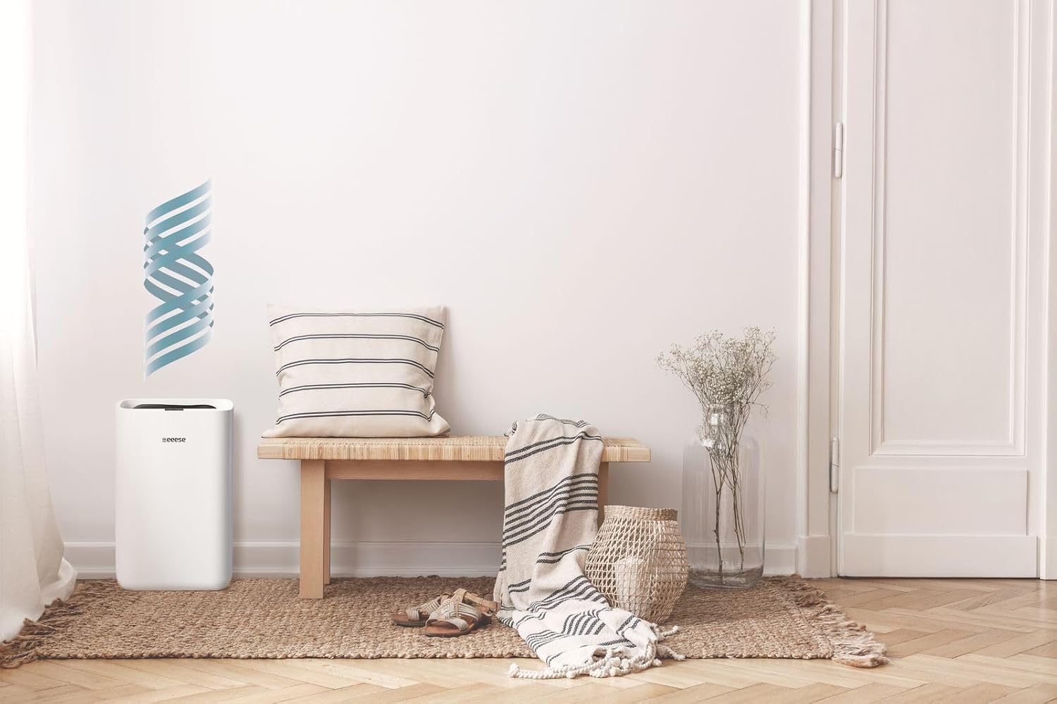 Eeese Hugo 13 L Dehumidifier placed in a living room setting