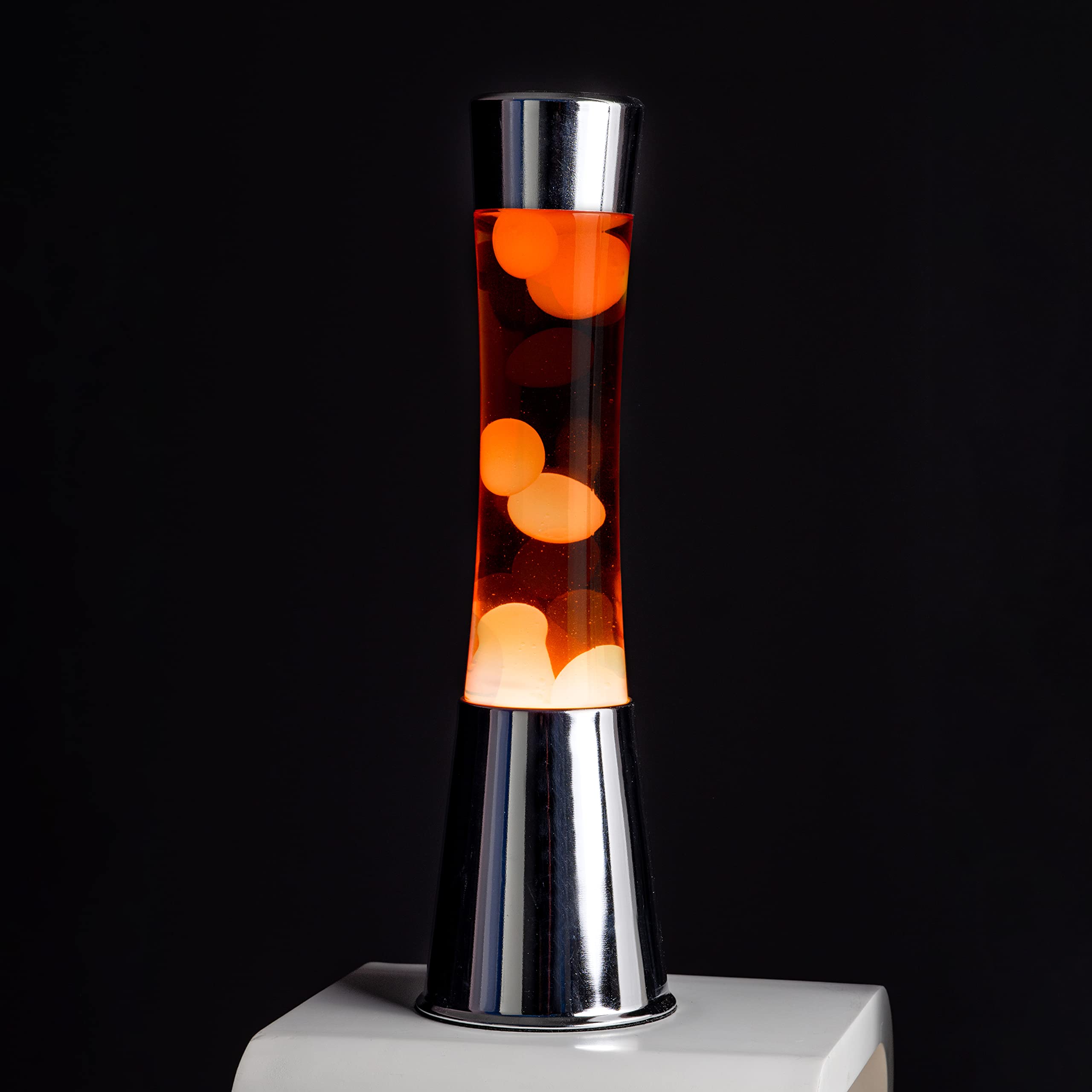 Fisura - Lámpara de lava naranja. Base plateada cromada, líquido y lava naranja. Lámpara efecto relajante. Con bombilla de repuesto. 11 cm x 11cm x 39,5 cm.…
