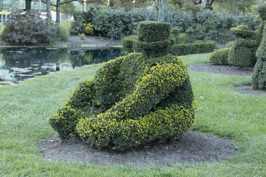 Photograph - This and other clipped shrub figures in the Topiary Garden in downtown Columbus, Ohio, at the Old Deaf School Park, were created to represent those in a classic painting 2 12in x 08in