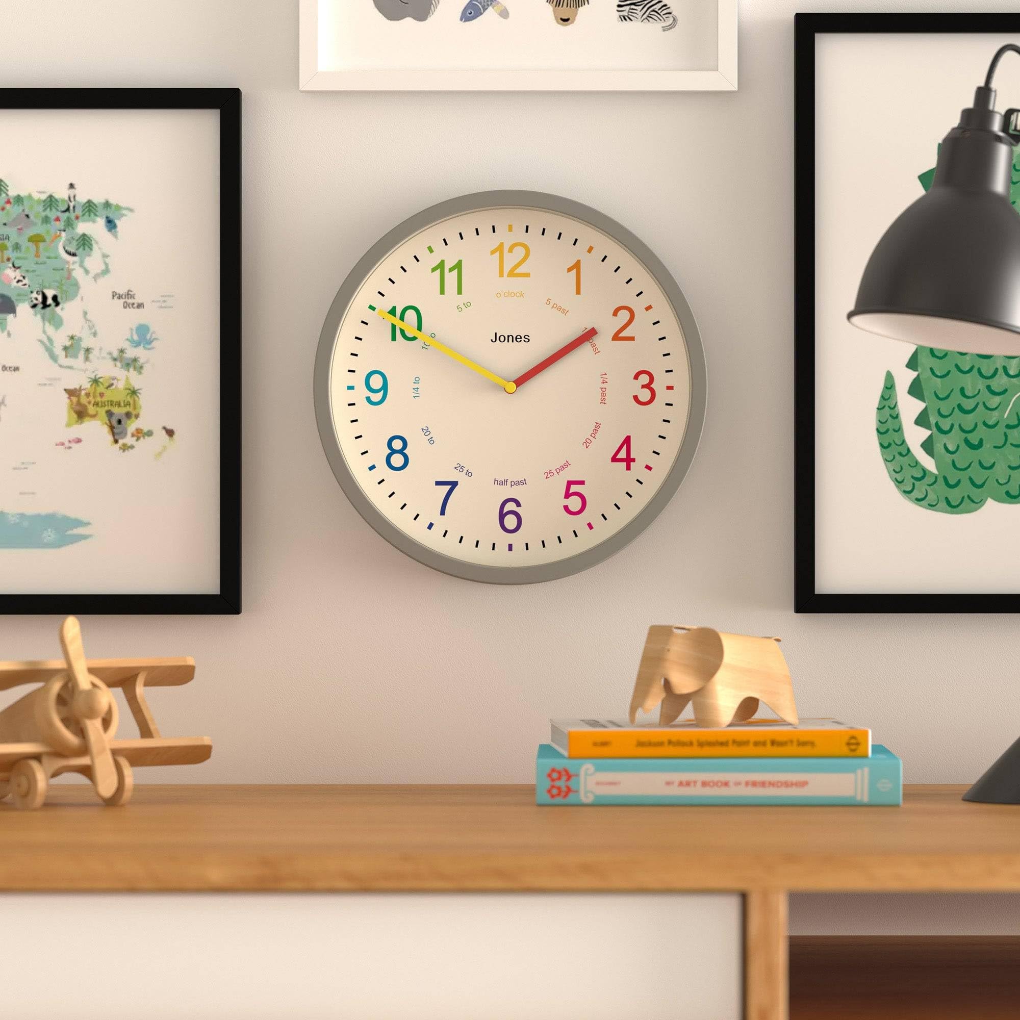JONES CLOCKS® Kids Reloj de Pared | Pequeño Reloj Moderno para la guardería Infantil | 25cm | Grey | Dial Colorido para Aprender a medir la Hora
