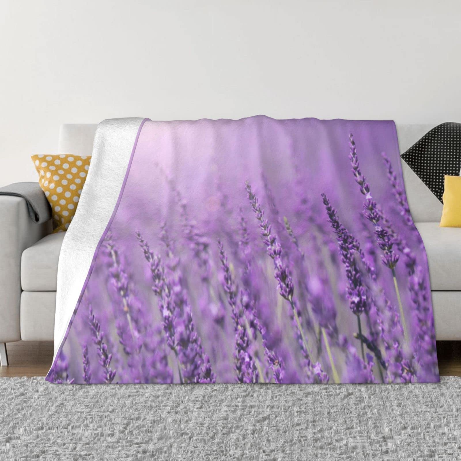 Couverture polaire violette contre le froid pour canapé confortable