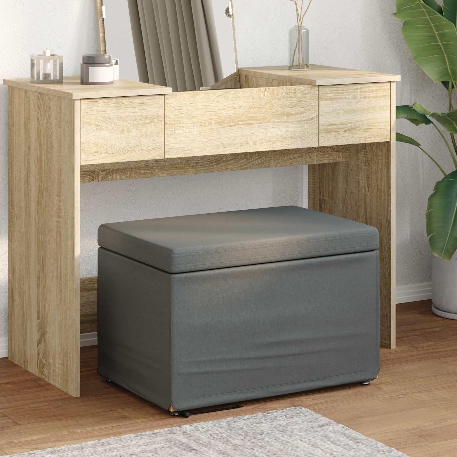 Tabouret compact gris foncé pour optimiser les petits espaces