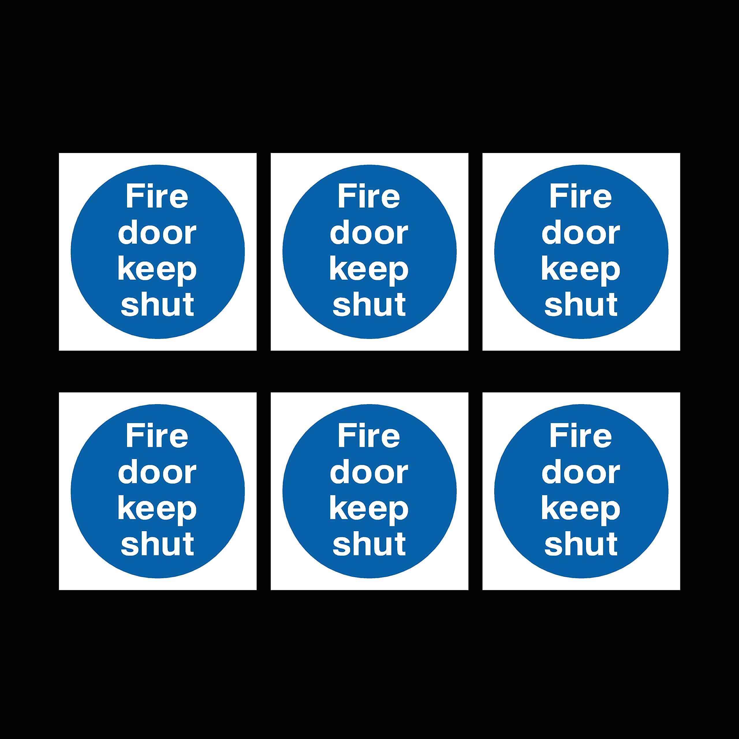 Cartello di sicurezza con scrittaThis door is alared for use in
