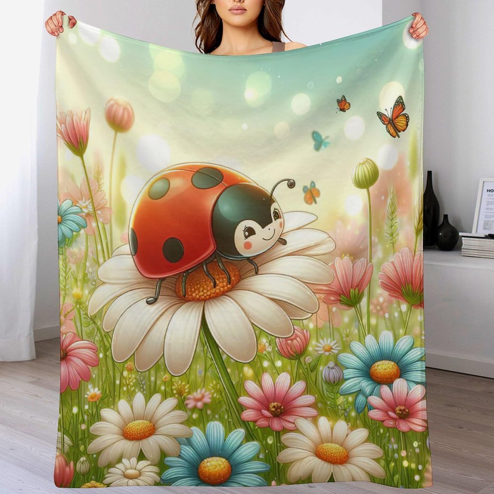 Plaid coccinelle en flanelle pour cocooning sur le sofa et lit d'enfant