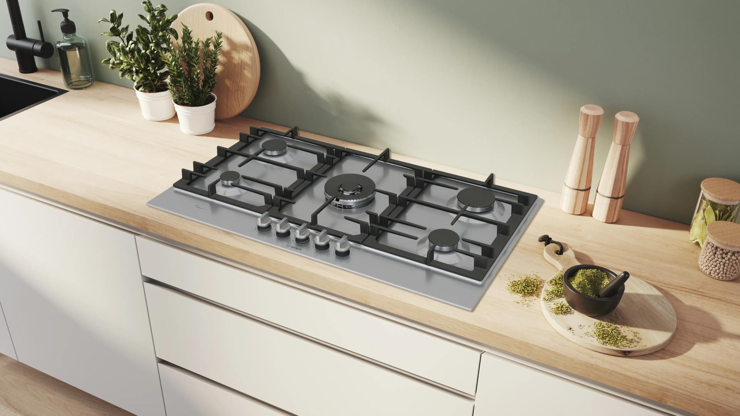 Image secondaire de Plaque de cuisson à gaz Bosch PCR9A5I90 avec FlameSelect et poignées amovibles