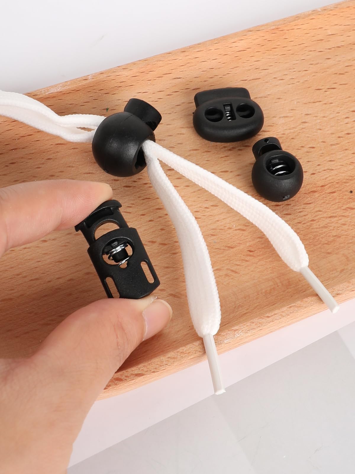 40 Pcs Cord Locks, Plastic Cord Lock for Drawstrings, Black Spring Toggle Stopper with 4 Sizes, Elastic Cords Adjuster for Drawstring, Shoelaces, Clothing and Bags