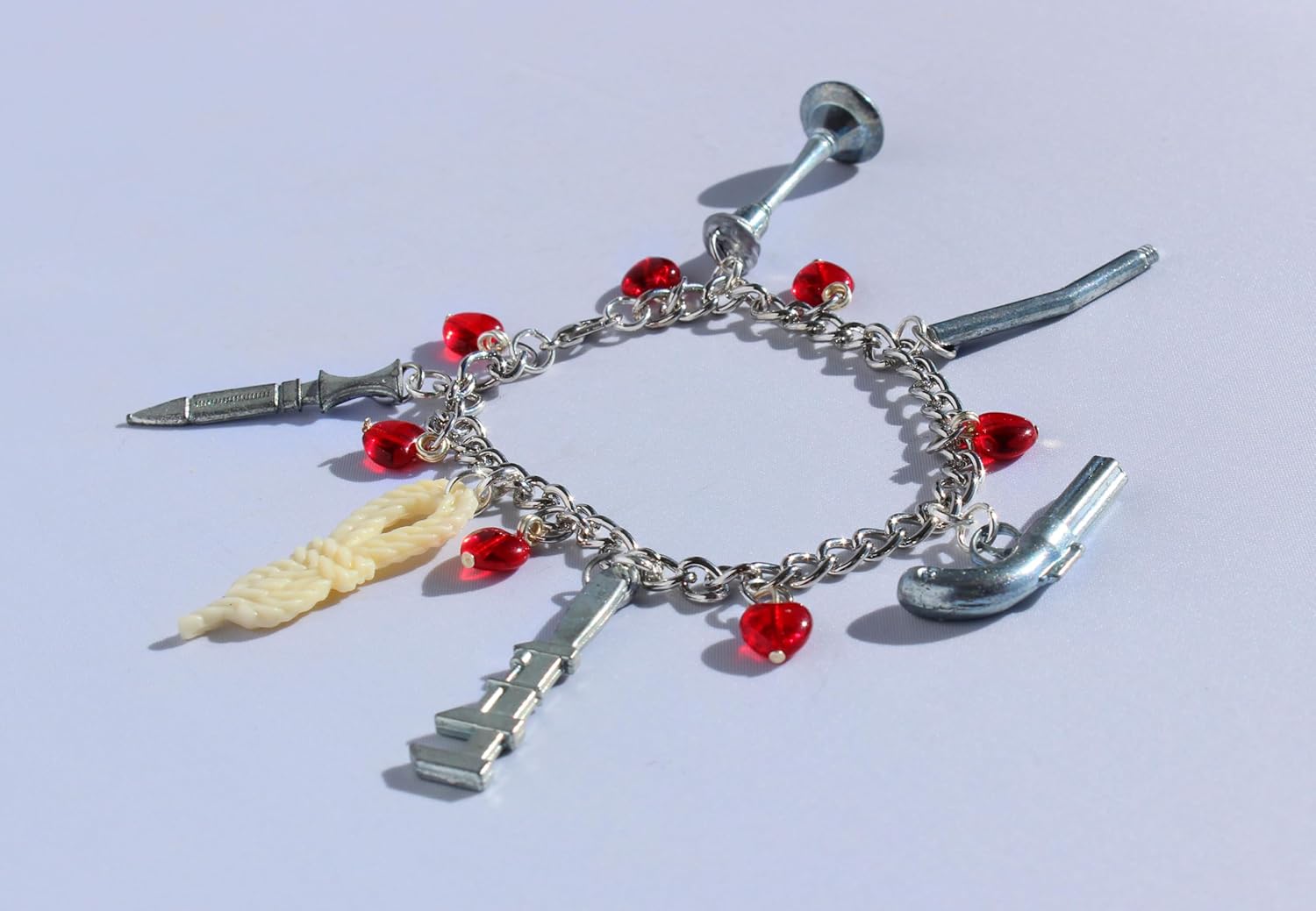 Clue Token Charm Bracelet with Heart-Shaped Beads
