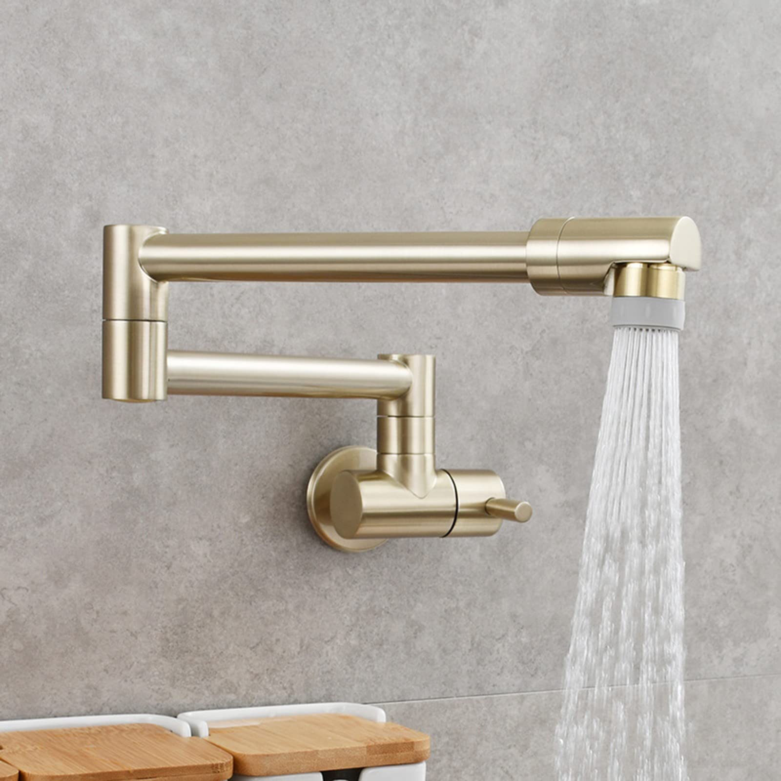 Robinet de cuisine mural double articulation en or brossé orientable