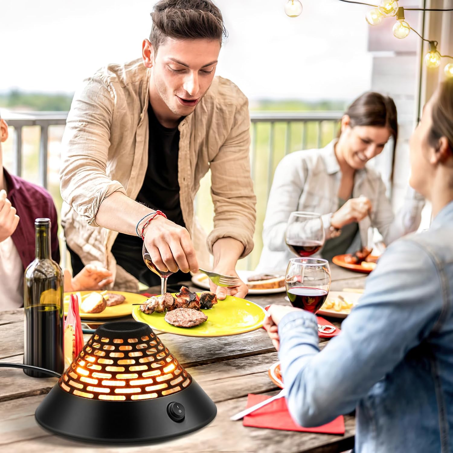 Haoteey 400W Electric Radiant Infrared Heater on an outdoor table with people dining, illustrating its versatile use.