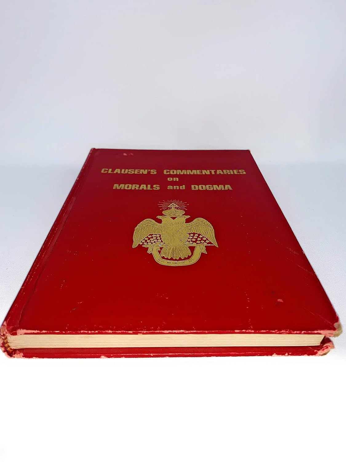 Clausen's commentaries on morals and dogma      Hardcover – January 1, 1974