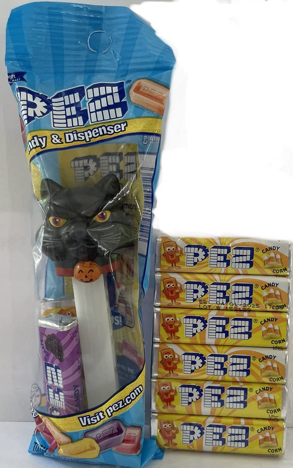 Glowing Black Cat Pez Dispenser in Cello Bag with 2 Rolls of Candy + 6 Roll Pack Candy Corn Flavored Candy Refills Bundle 