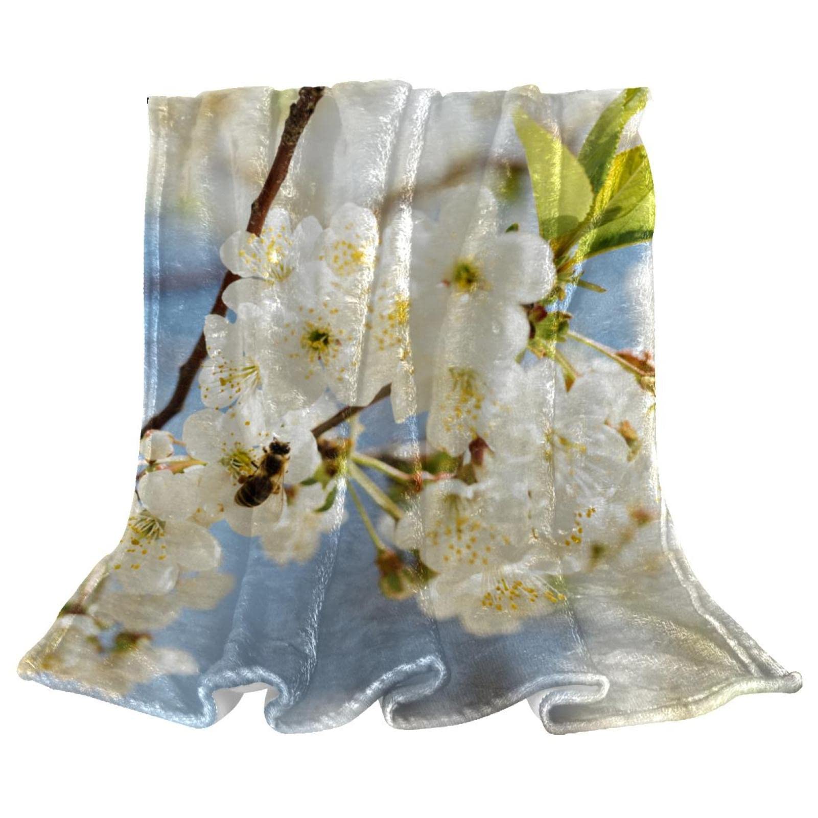 Jeté de lit en polaire fleuri pour cocooning sur le canapé