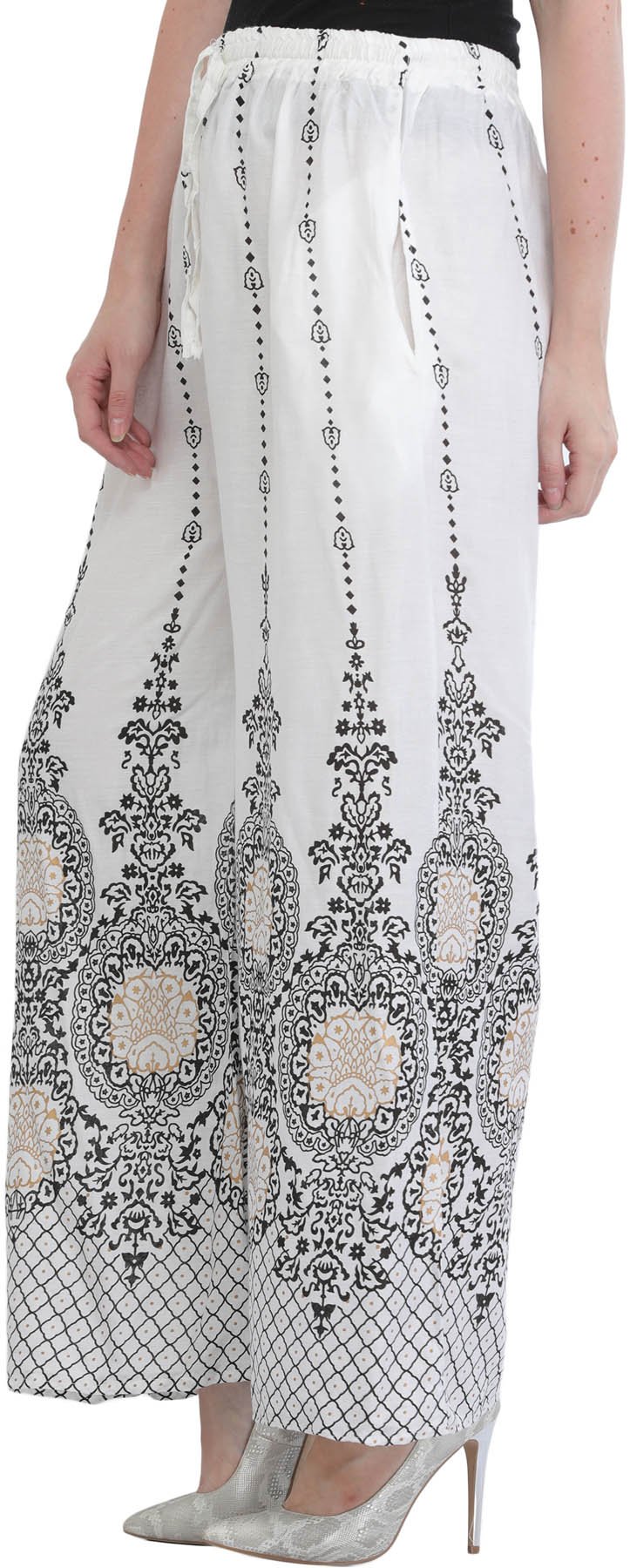 Exotic India Casual Yoga Trousers with Golden Floral Pr - Color Egret White