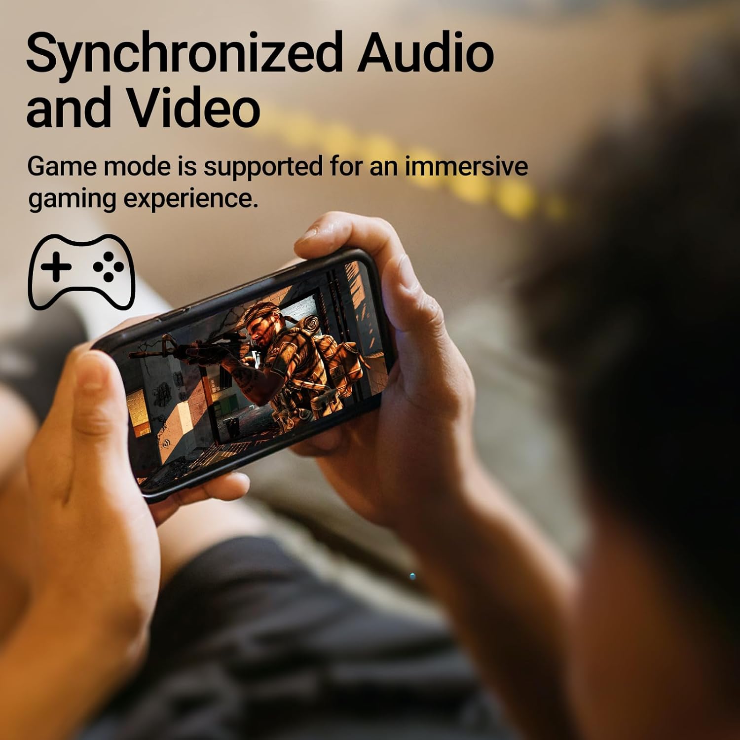 Person playing a mobile game with Edifier X3s earbuds