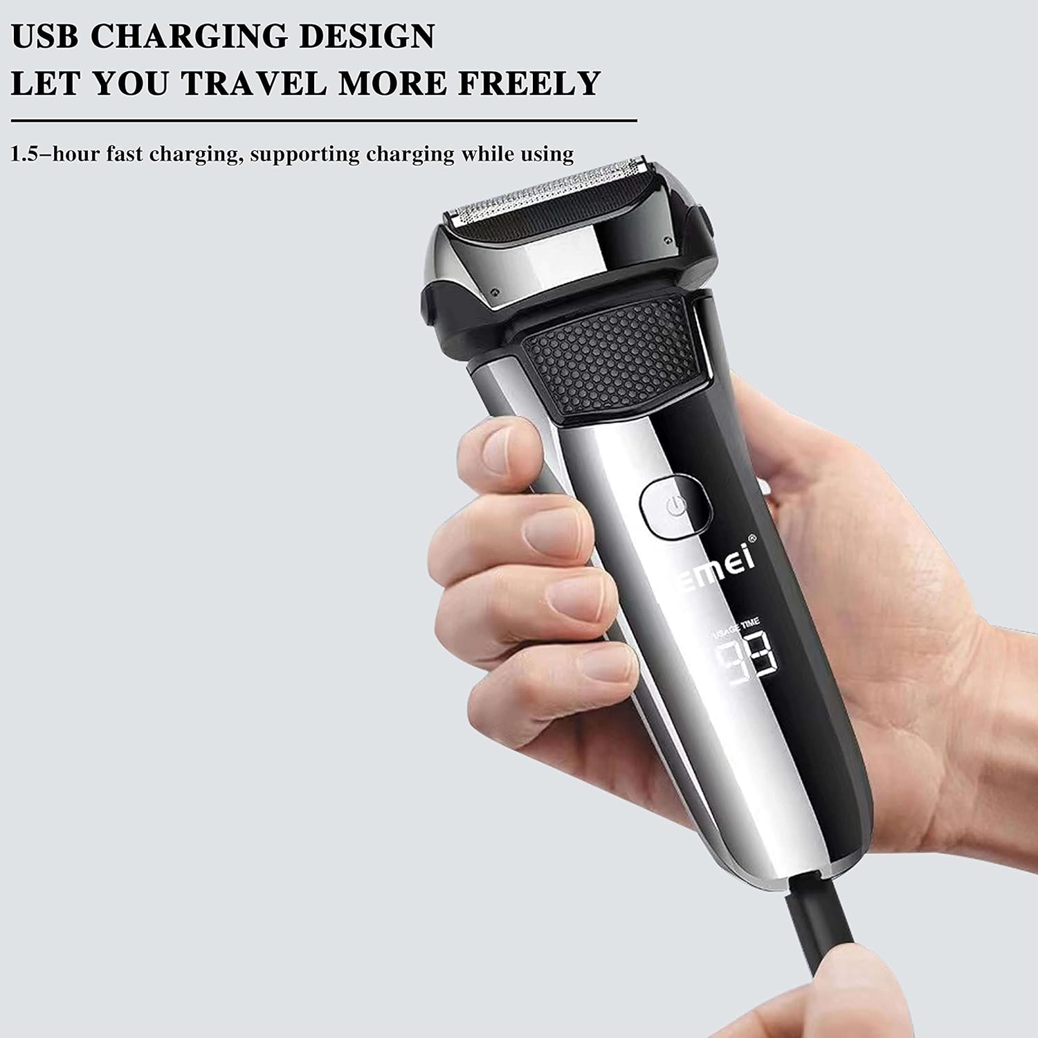 Hand holding the KEMEI shaver connected to a USB-C charging cable