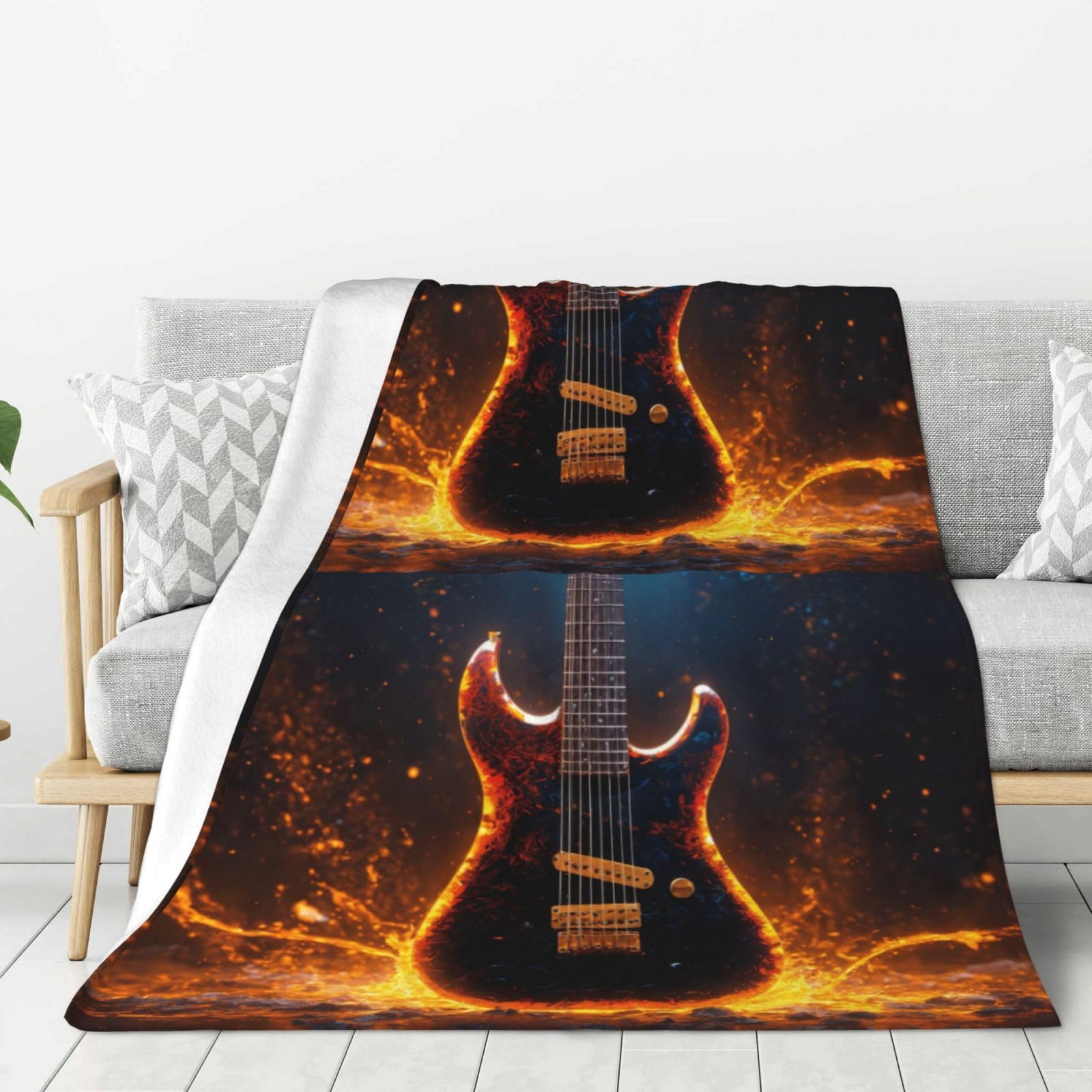 Couverture chaude flanelle guitare contre le froid sur le canapé