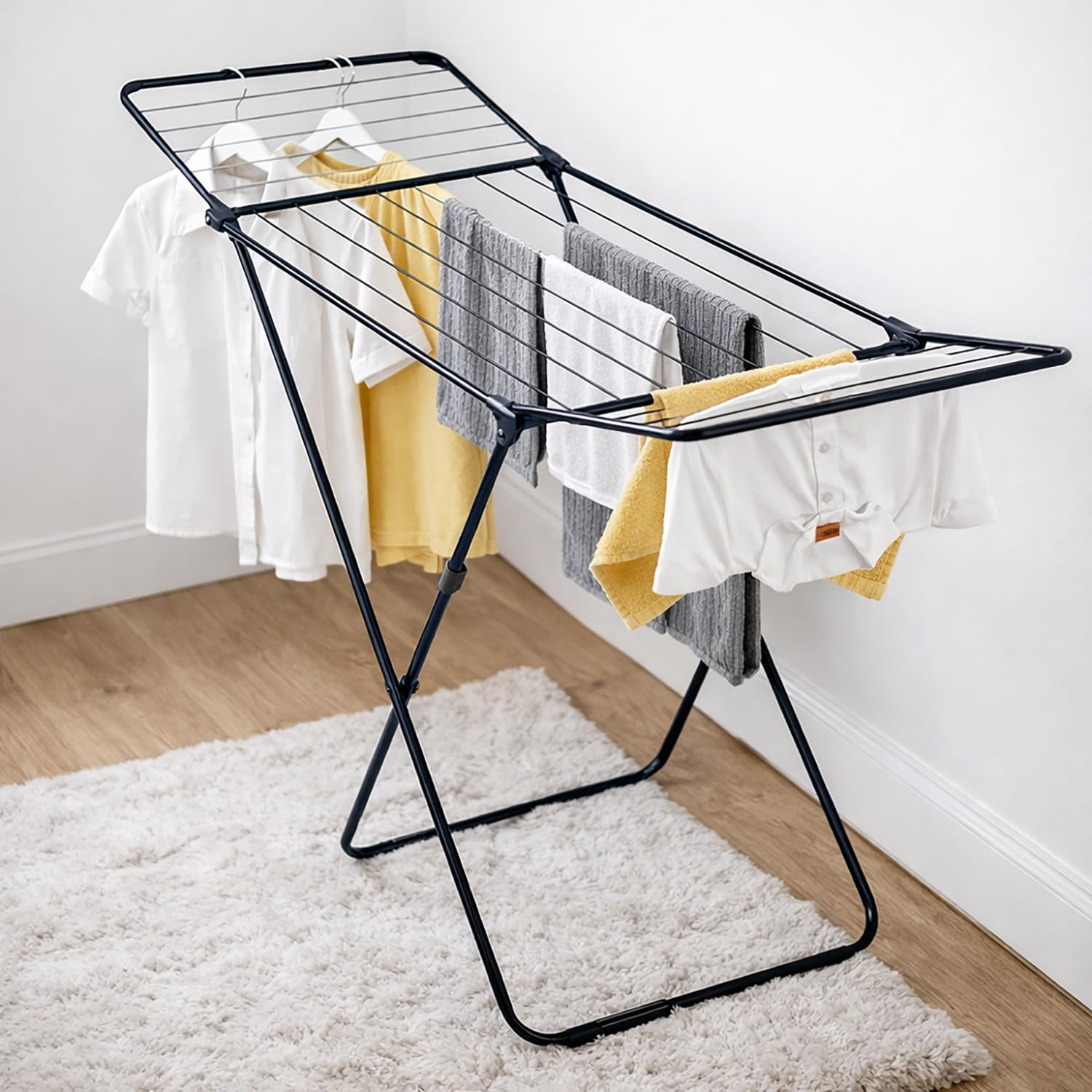 TIENDA EURASIA - Tendedero de Ropa Plegable | Estructura Metálica Ligera | Capacidad de Carga 20 Kg | Medidas Abierto 180x50x100 cm y Cerrado 126x50x100 cm (Negro)