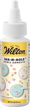Wilton Dab-N-Hold Edible Adhesive - Clear Food Glue - Baking Accessory for Cake Decoration, Fondant, Sugar Sheets & Icing Decorations - Easy-to-Use - 2 fl oz