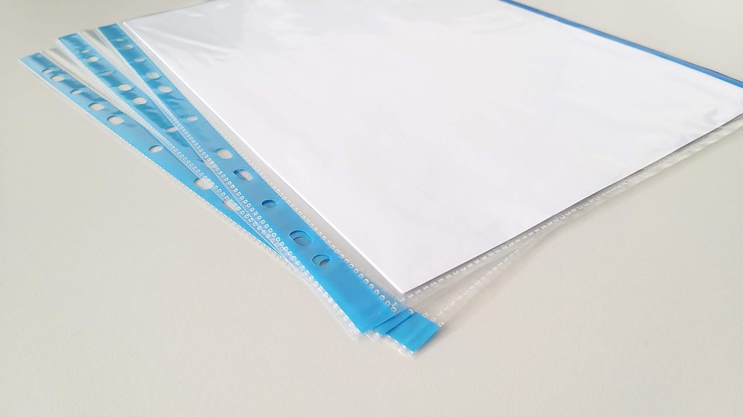 Punched Pockets DONAU PP A4 Orange Peel 40 Micron Coloured Spine Feature Blue 100pcs / Document Archiving/Type-Crystal/Kind-Coloured Edge/Material-PP/Colour-Blue/Format-A4 - Image 3