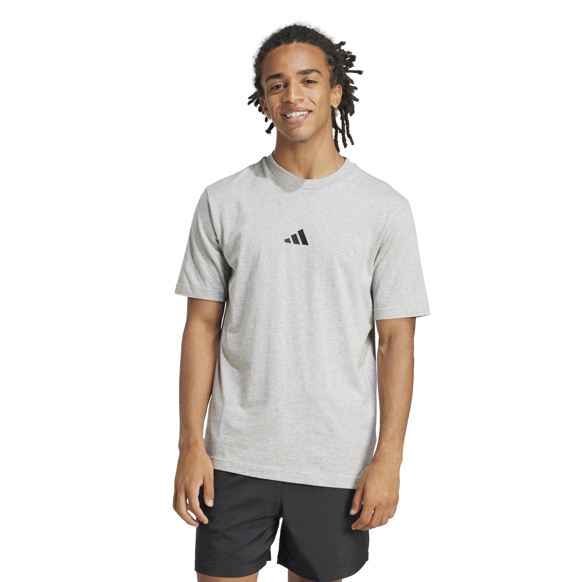 Close-up of the small, embroidered adidas Originals logo on the chest of the single jersey t-shirt.