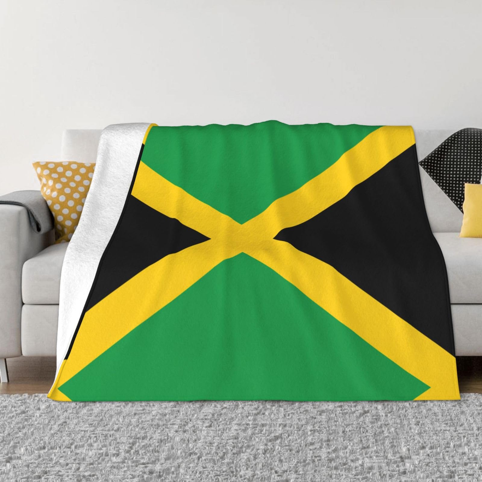 Couverture flanelle Jamaïque pliable pour des soirées cocooning au salon