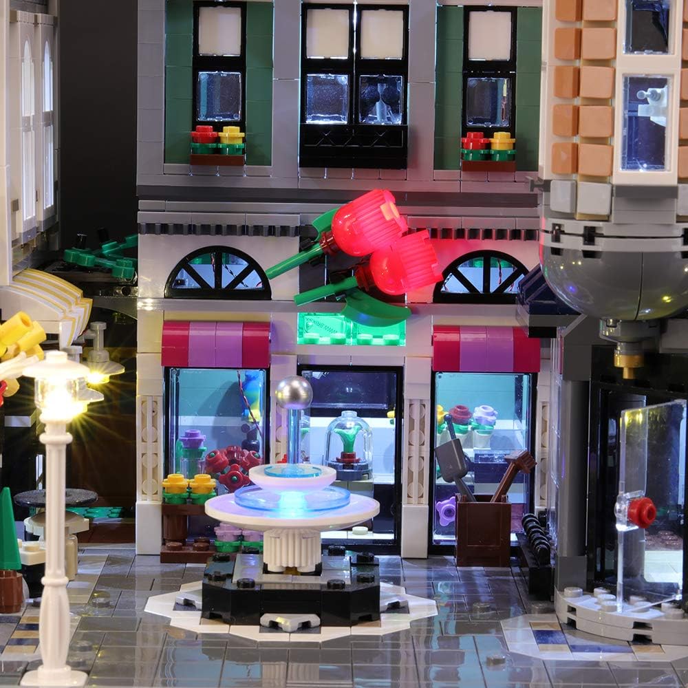 Front view of the lit-up LEGO 10255 Assembly Square with BRIKSMAX LED lights
