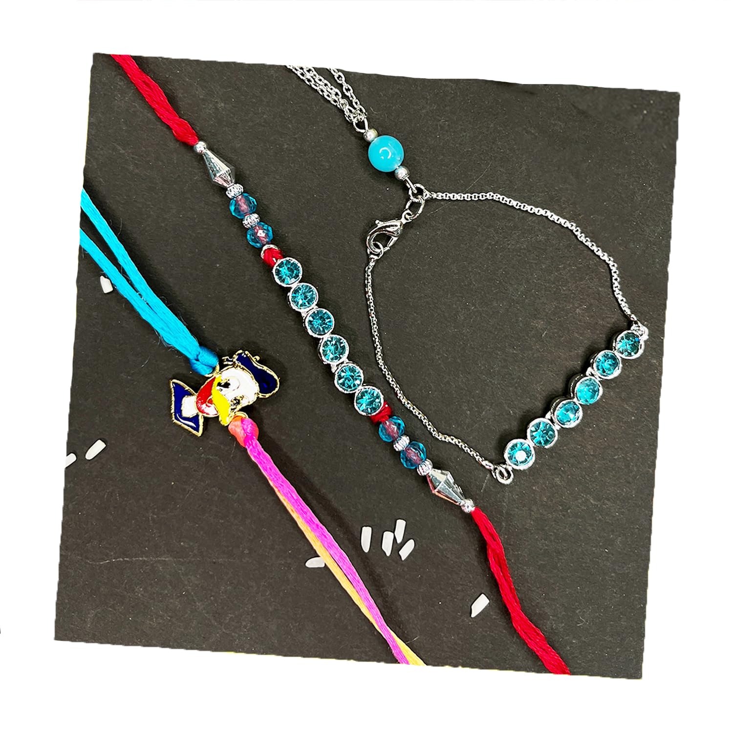 Mahi Combo of Blue Crystal Studded Couple Rakhi and Meenakari Cartoon Rakhi for Bhaiya Bhabhi and Bhatija(RCOLB1105733R) (B0D8BX89J8) Amazon Price History, Amazon Price Tracker