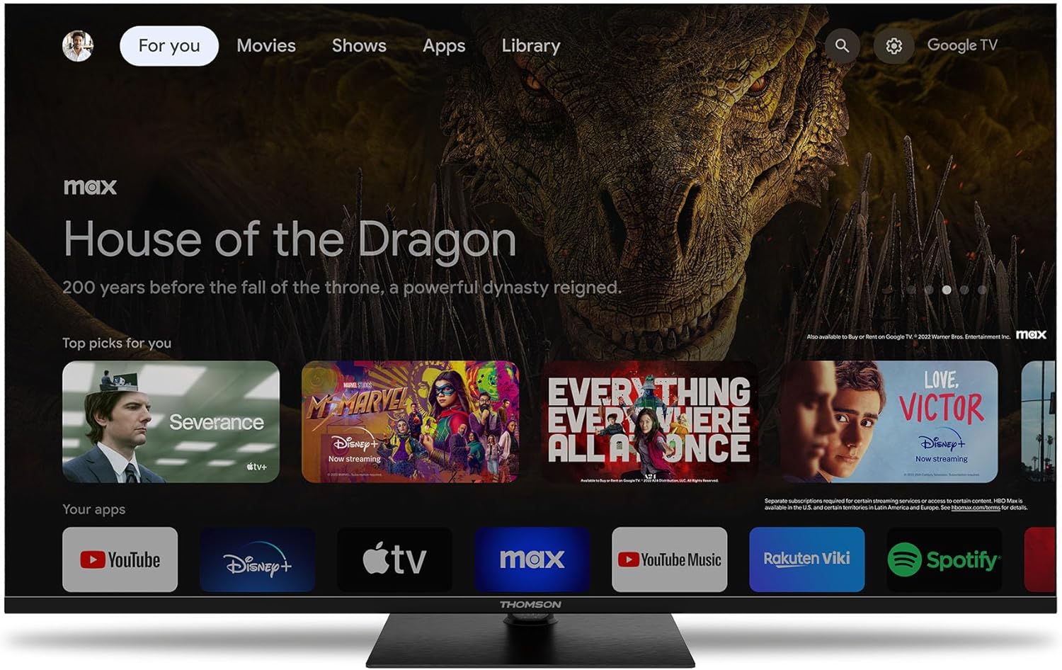 People watching TV with visual representations of sound waves emanating from the screen, indicating Dolby Audio.