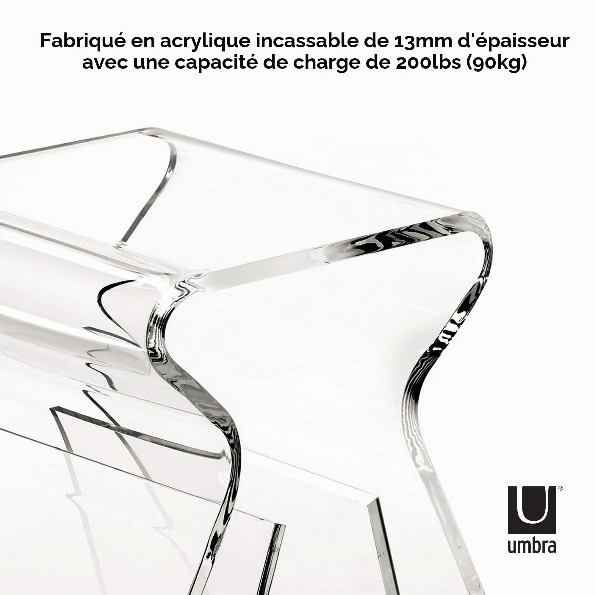 UMBRA Magino stool. Petite table d'appoint ou chevet Magino, avec range-magazines sur les 2 pieds. En Acrylique transparant. Dimension 42x29x43cm.