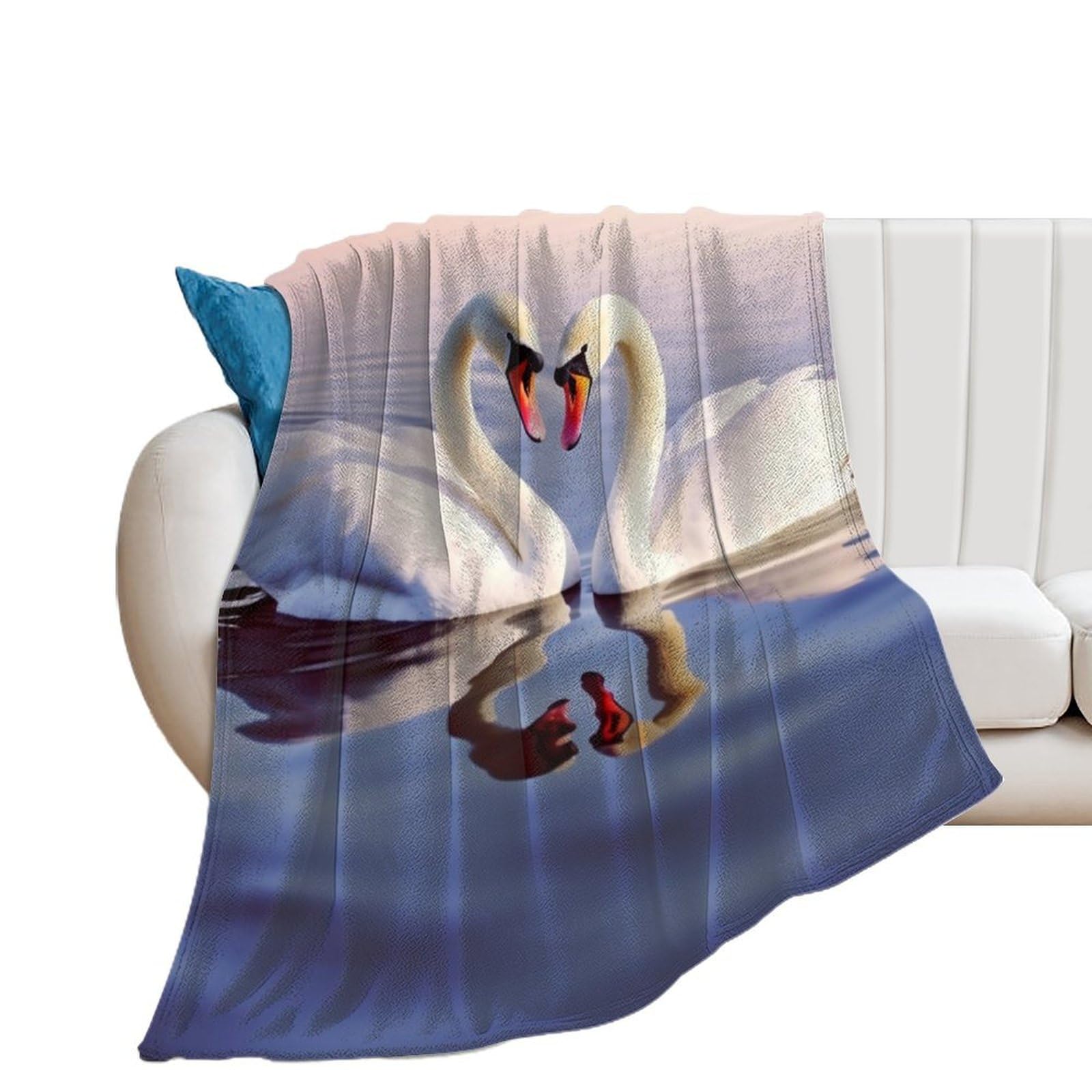 Couverture flanelle cygne légère pour vos soirées cocooning devant la télé
