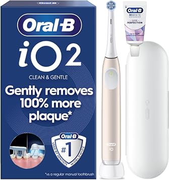 Oral-B iO 2 Electric Toothbrush, Calm Pink, Includes Toothpaste | Travel Case, 1 Brush Head, Up to 4 Weeks Battery, 3 Cleaning Modes, Gum Pressure Sensor, Rechargeable