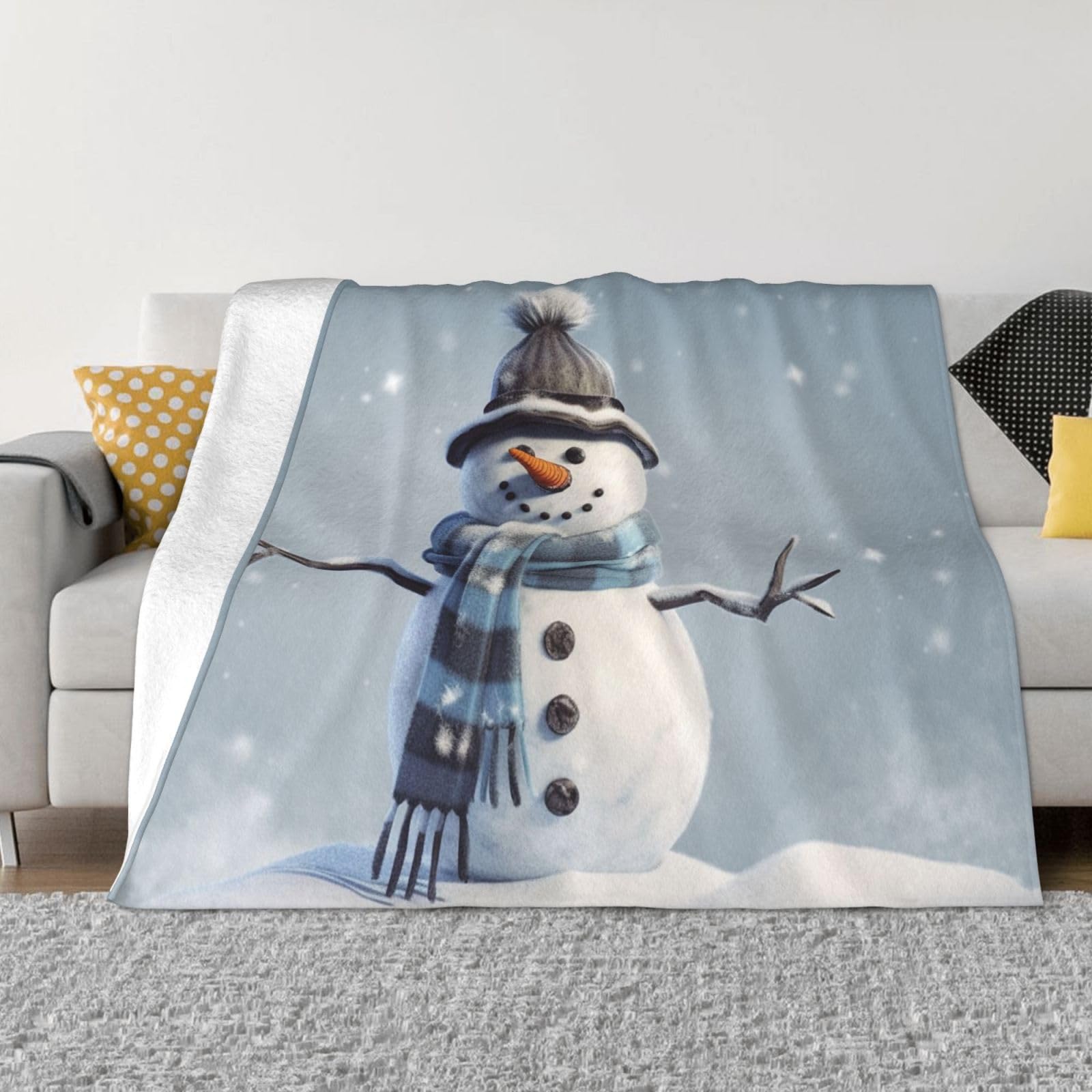 Plaid bonhomme de neige en flanelle chaude contre les frissons du soir sur le canape