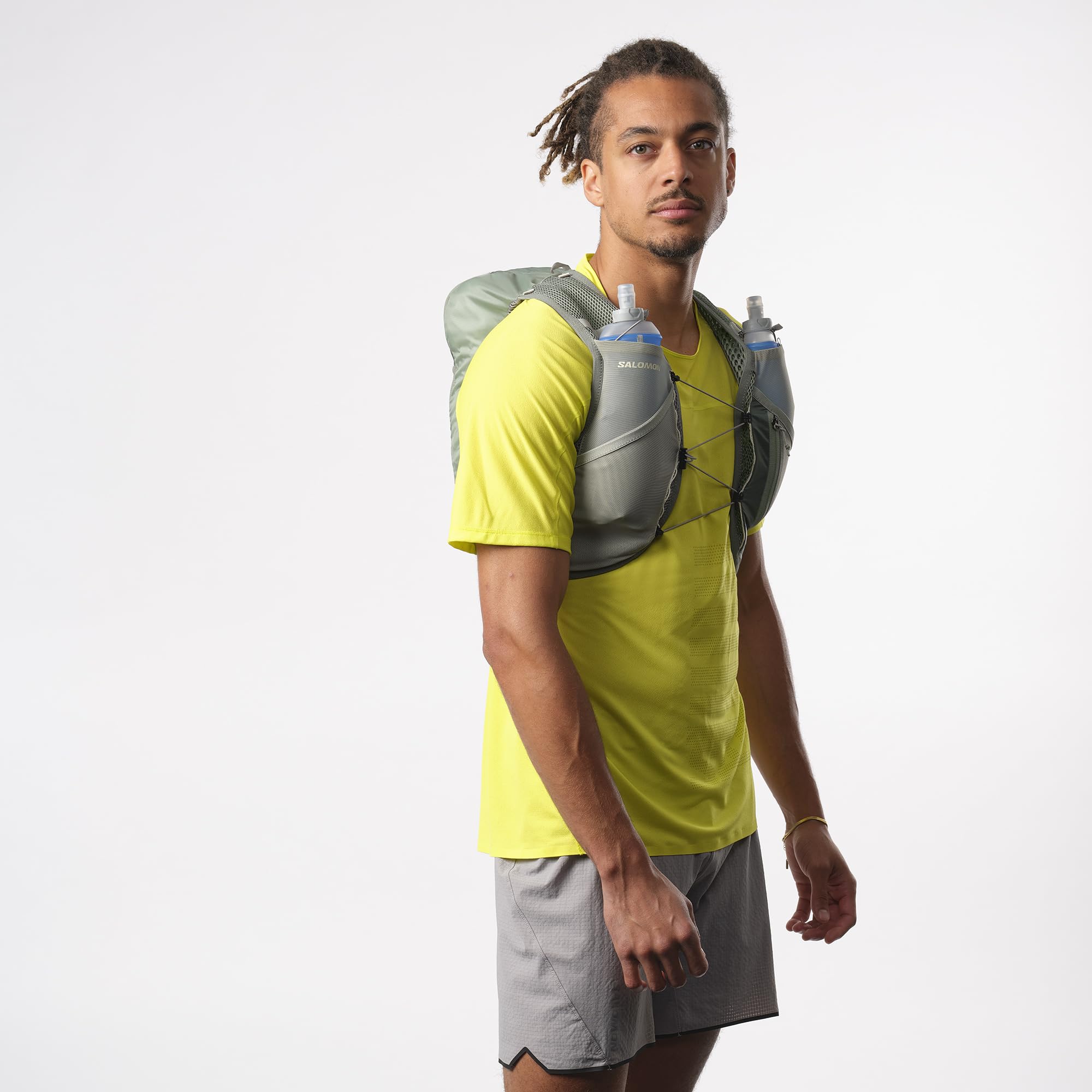 Salomon Active Skin 8 Unisex kamizelka nawadniająca do biegania szlak turystyczny z butelkami w zestawie, łatwe nawodnienie, precyzyjne dopasowanie 8 l i zoptymalizowane przechowywanie, zielona, L