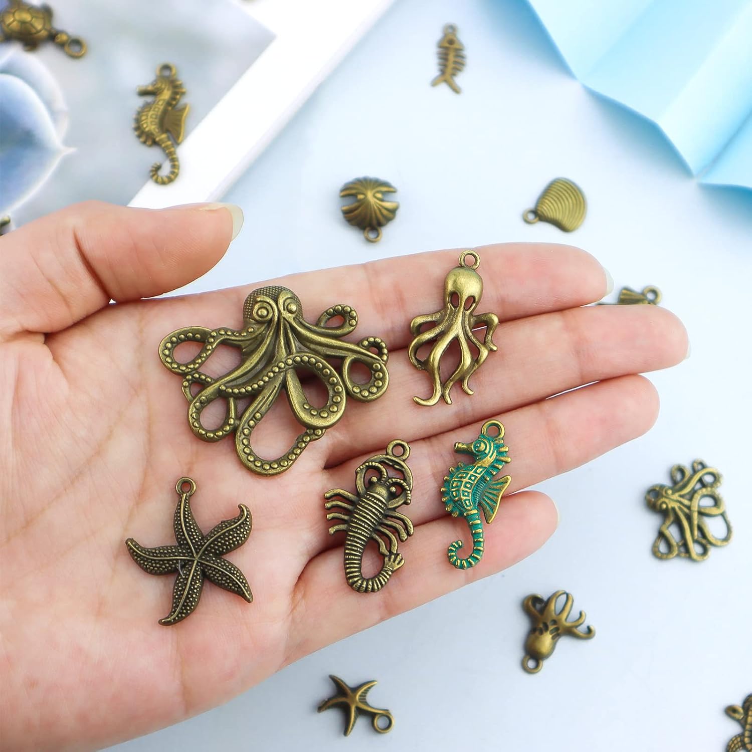 JIALEEY 100 Gram Assorted Antique Ocean Themed Charms Bronze Ocean Fish Sea Creatures Beads Pendants for Jewelry Making and Craft Making - Image 3