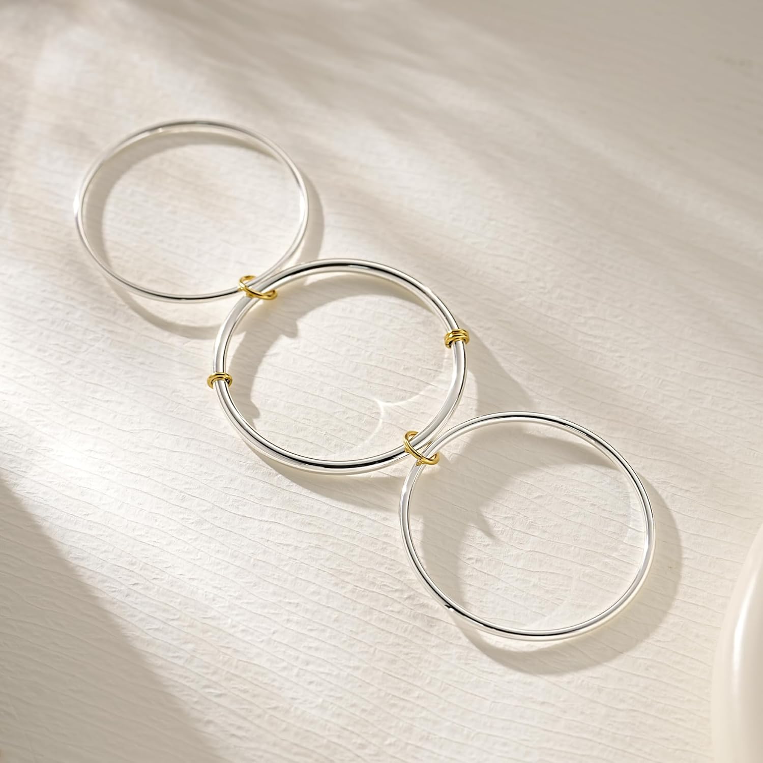 NOKMIT Triple Interlocked Stackable Bangle Bracelets for Women 3-Pack Two-Tone High Polished Stainless Steel Bangle Set Classic Plain Thin Non-Tarnish Gold&Silver - Image 3