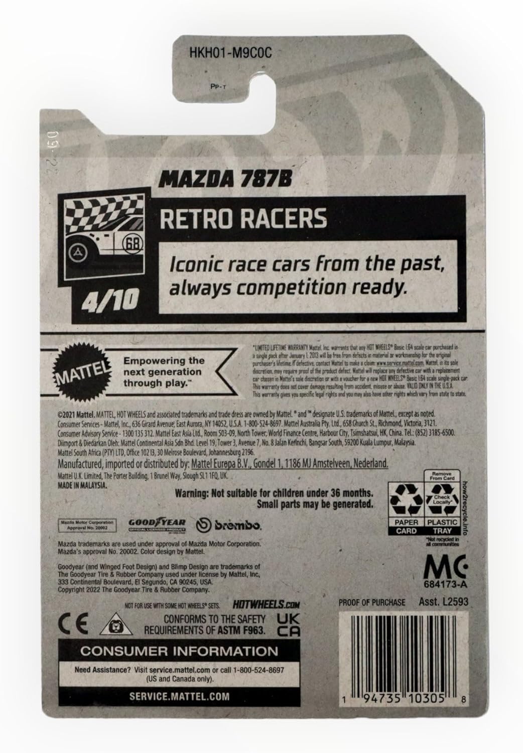 Back of Hot Wheels Mazda 787B packaging with safety and warranty details
