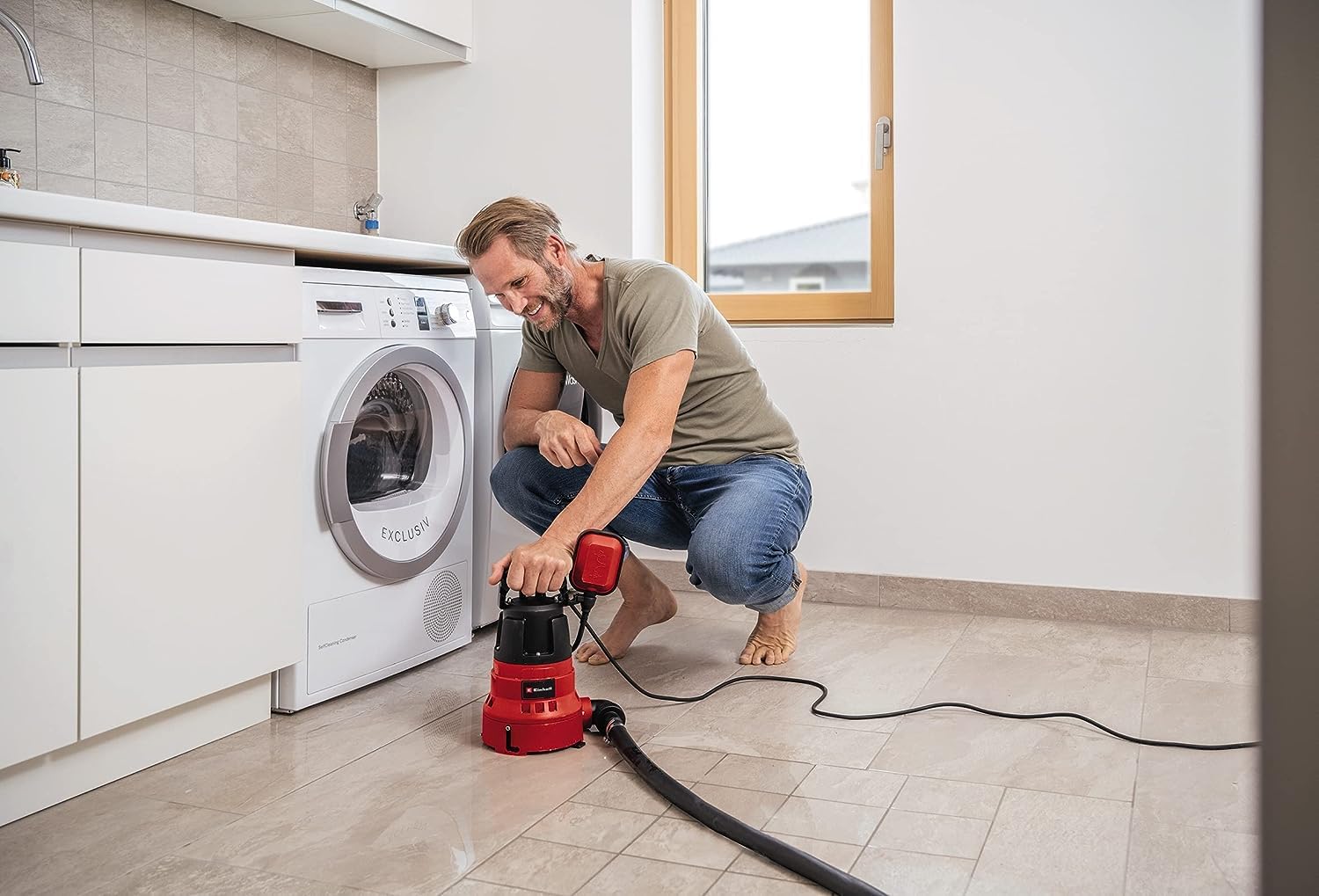 Einhell Bomba de aguas sucias GC-DP 7035 LL (700 W, aspirando en plano hasta 1 mm, caudal 16.000 l/h, 0,8 bares, profundidad de inmersión 7 m, ajustable para aguas sucias y claras)